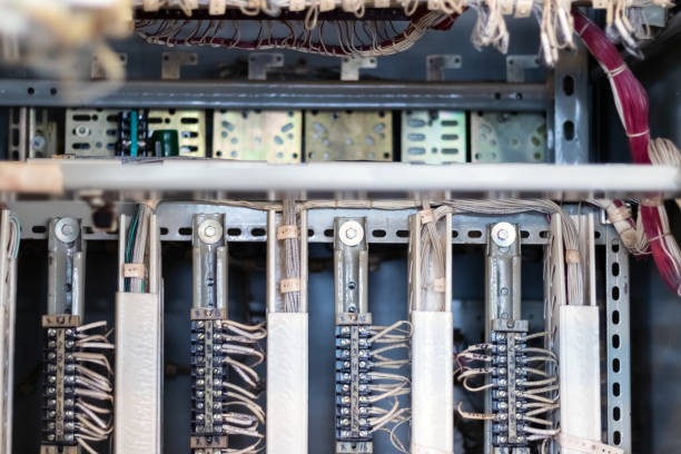 Electrical bus connection wires in the control cabinet. Close-up.