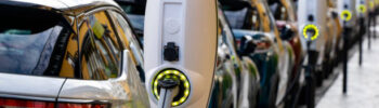 Paris, France - 13 November, 2019: Public charging points in a row on the street. The charging points are a popular view in European cities.