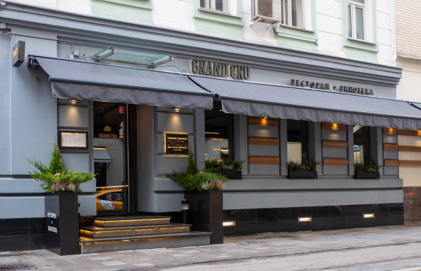 October 15, 2021. Moscow, Russia. A sign on the building of the Grand Cru Restaurant on Malaya Bronnaya Street in Moscow, awarded one star of the Michelin Red Guide restaurant rating.