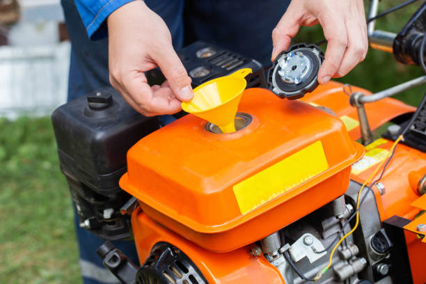 Refueling with gasoline walk-behind tractor to get started, industry.
