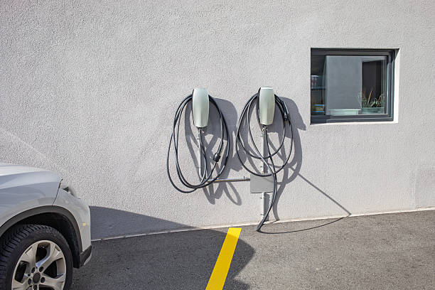 Charging station for electric cars on the outside wall of a building