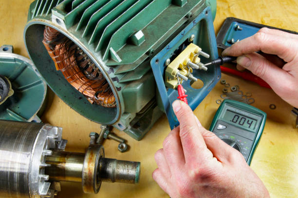 An engineer using a multi meter to check phase continuity